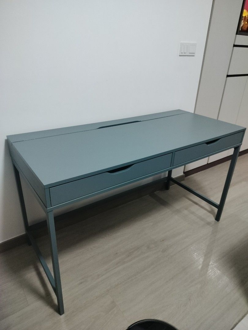 Study Table (Category: Tables & Sets) located in Singapore. Submitted by ashthekey (Listing ID 1403903604, Image 1). Description: IKEA blue study table in decent condition. Rarely used and relatively new. There are a few small scratches but they're not that visible. bought at $229. 132x58cm payment using paylah/paynow preferably.