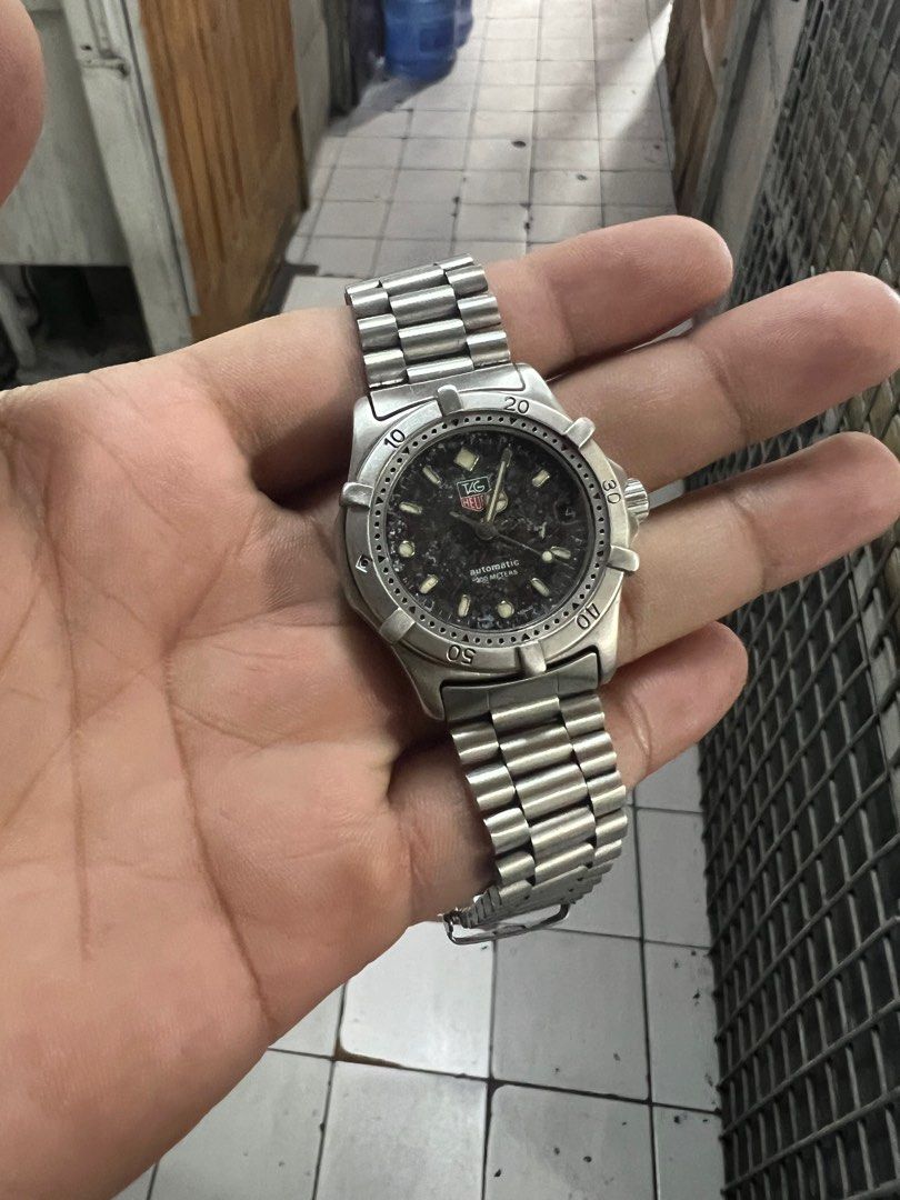 Tag Heuer Automatic Watch (Category: Luxury Watches) located in Caloocan City. Submitted by _alennchan (Listing ID 1403817662, Image 3). Description: Rare Tag Heuer Professional 2000 Series “Nebula” Automatic A one of kind timepiece, from black turned to a beautiful patina that released from the 90’s. This unique watch has a story and is guaranteed to be only one. A true collector must have this watch. - Condition: 9.7/10 - No issue/ Mint conditi
