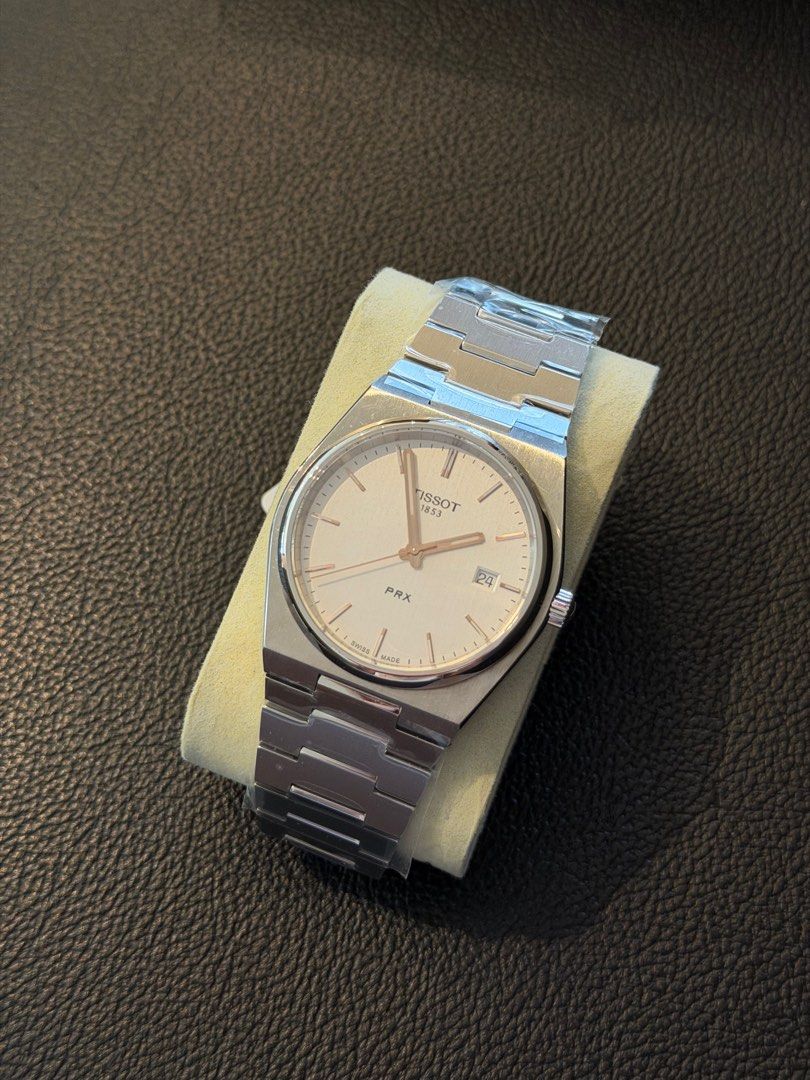Tissot PRX Quartz (Category: Luxury Watches) located in Angeles City. Submitted by horologe (Listing ID 1403975985, Image 1). Description: Tissot Prx Quartz - White Dial with Rosegold Indices 40mm Complete Box, Papers, and Warranty Original and Brandnew ₱17,500 ONLY Negotiable for Sure Buyers Only PM .
