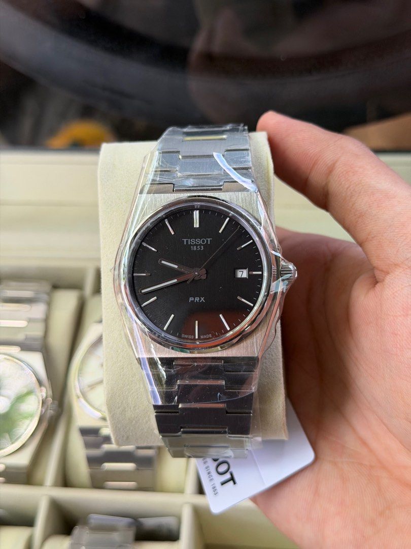 Tissot PRX Quartz - Black Dial (Category: Luxury Watches) located in Angeles City. Submitted by horologe (Listing ID 1403976184, Image 1). Description: Tissot Prx Quartz - Black Dial 40mm Complete Box, Papers, and Warranty Original and Brandnew ₱17,500 ONLY Negotiable for Sure Buyers Only PM .