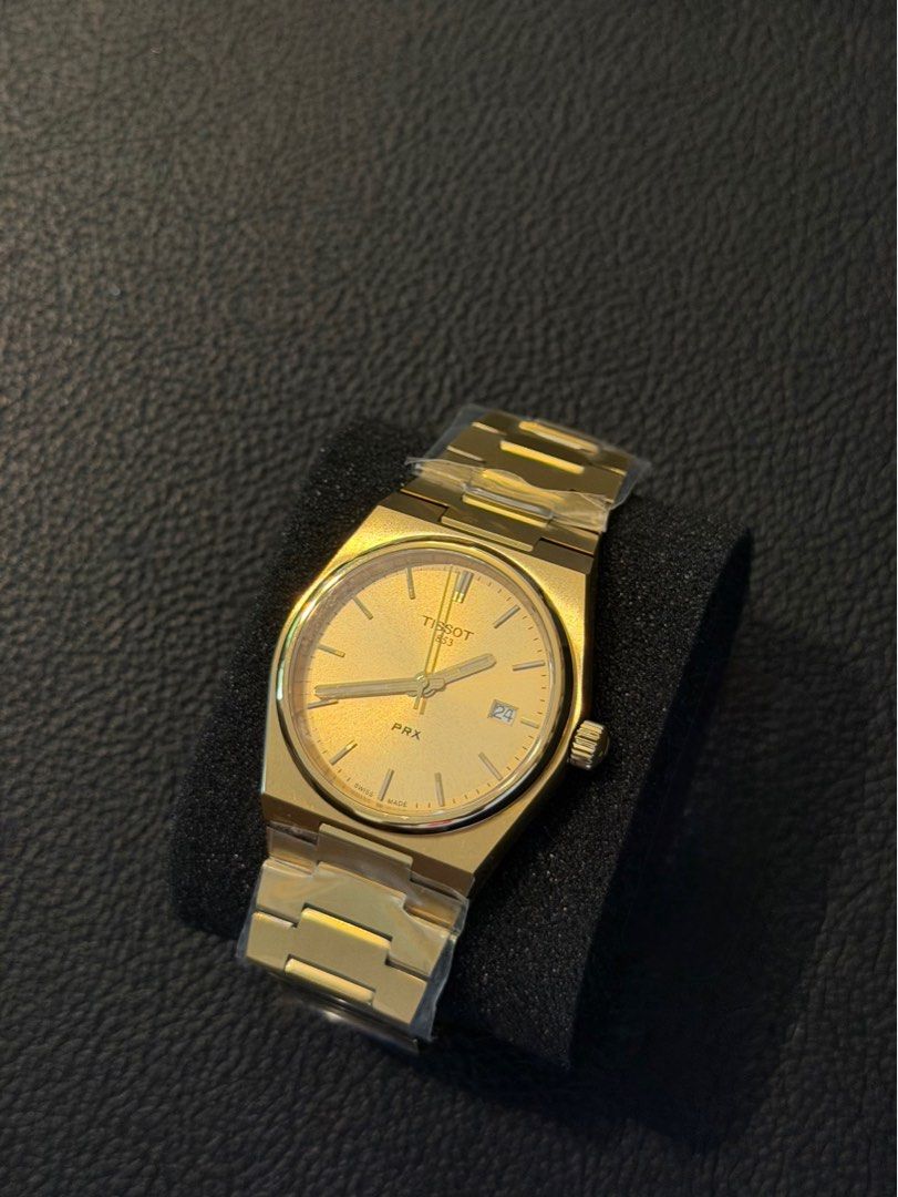 Tissot PRX Quartz - Gold (Category: Luxury Watches) located in Angeles City. Submitted by horologe (Listing ID 1403974331, Image 1). Description: Tissot Prx Quartz - Gold 35mm Complete Box, Papers, and Warranty Original and Brandnew ₱19,500 ONLY Negotiable for Sure Buyers Only PM .