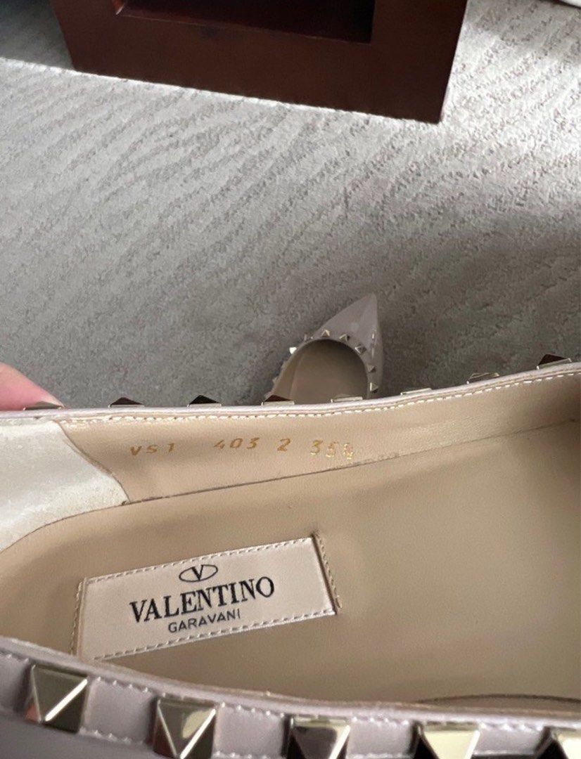 Valentino Garavani Rockstud Flats - 35.5 (Category: Flats & Sandals) located in Quezon City. Submitted by lebasi0704 (Listing ID 1403956428, Image 3). Description: - Authentic Valentino Garavani Rockstud flats - Size: 35.5 (23cm insole) - Material: Nude patent leather - Made in Italy -Guaranteed authentic -Shoes only.