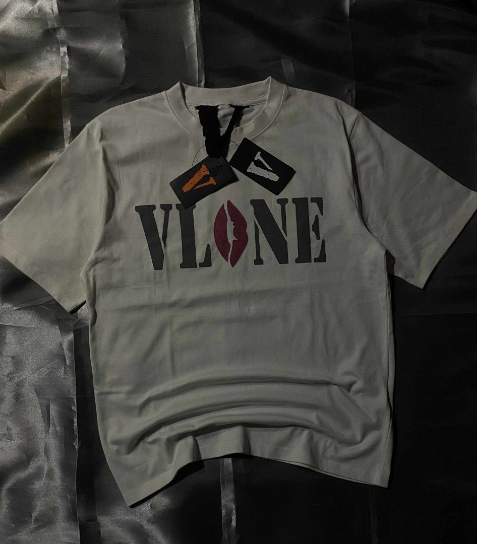 Vlone kissmark T-shirt (Category: Tshirts & Polo Shirts ) located in Taguig. Submitted by marked_item (Listing ID 1403937175, Image 1). Description: Vlone kissmark brand new with plastic size L to semi Xl pm sa details.