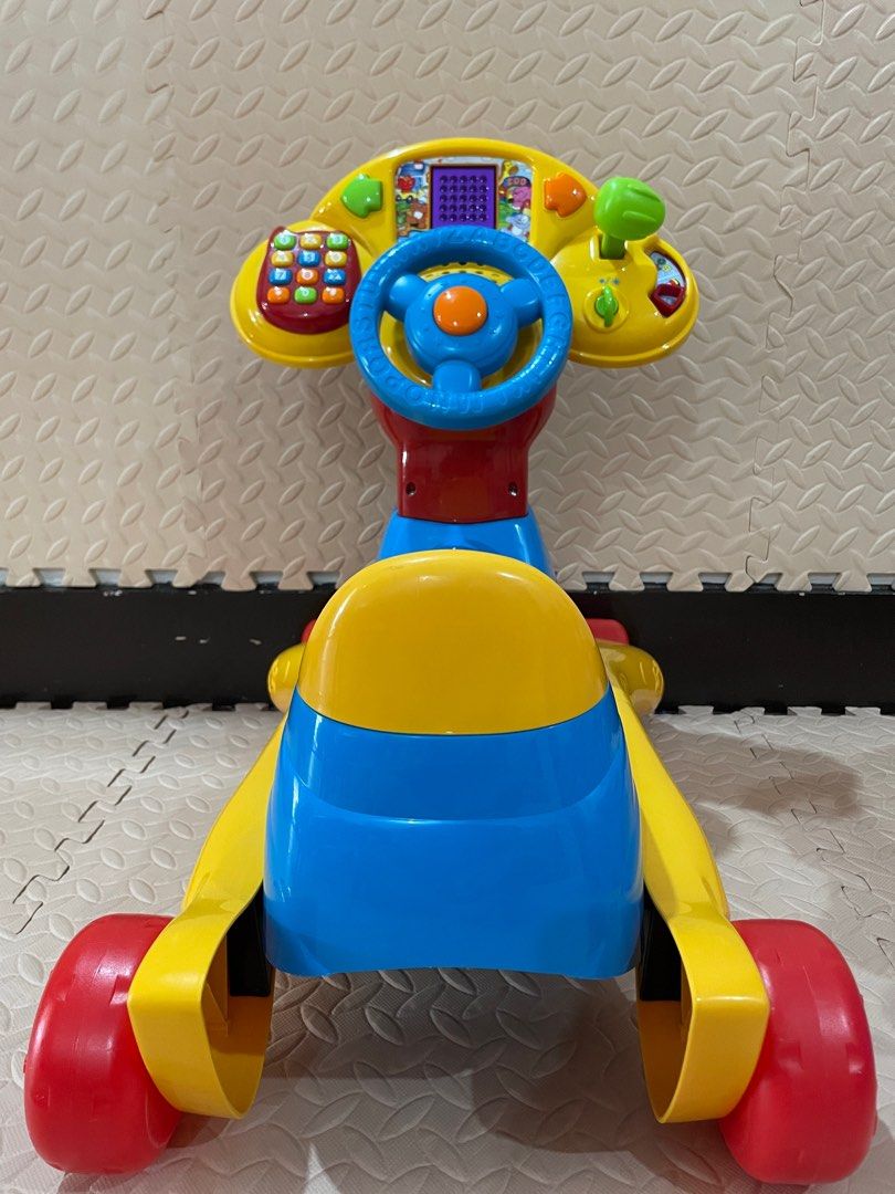V-Tech Colorful Ride-on Toy (Category: Infant Playtime) located in Las Pinas. Submitted by thingsupforgrab (Listing ID 1403847561, Image 2). Description: Like new but with crack at the bottom Used inside the room only.