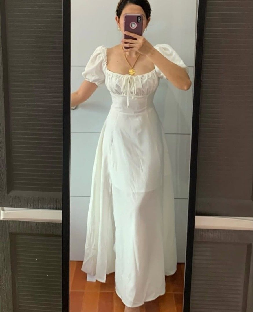 White Premium Maxi Dress with Slit (Category: Dresses) located in Pasig City. Submitted by ecasarmientodv (Listing ID 1403994488, Image 2). Description: Brandnew and really nice in actual. with side slit.