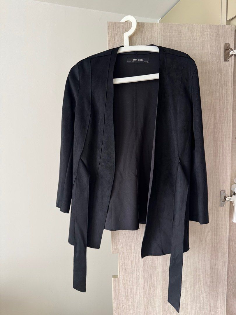 Zara Basic Black Jacket - (Category: Coats, Jackets and Outerwear) located in Singapore. Submitted by bellyaly (Listing ID 1403830934, Image 1). Description: - Zara Basic Faux Suede black jacket - Size S - Unworn - Open front design - Tie details - Perfect for layering.