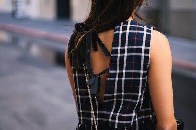 Zara Plaid Sleeveless Top with Ruffle Hem (Category: Sleeveless) located in Makati City. Submitted by secondavenue_ (Listing ID 1403870371, Image 2). Description: - Sleeveless plaid top in navy, white, and red. - Features a flattering peplum ruffle hem. - Unique tie-up back detail. - Lightweight fabric, ideal for warm weather. - Perfect for a casual chic look. - Used once only!.