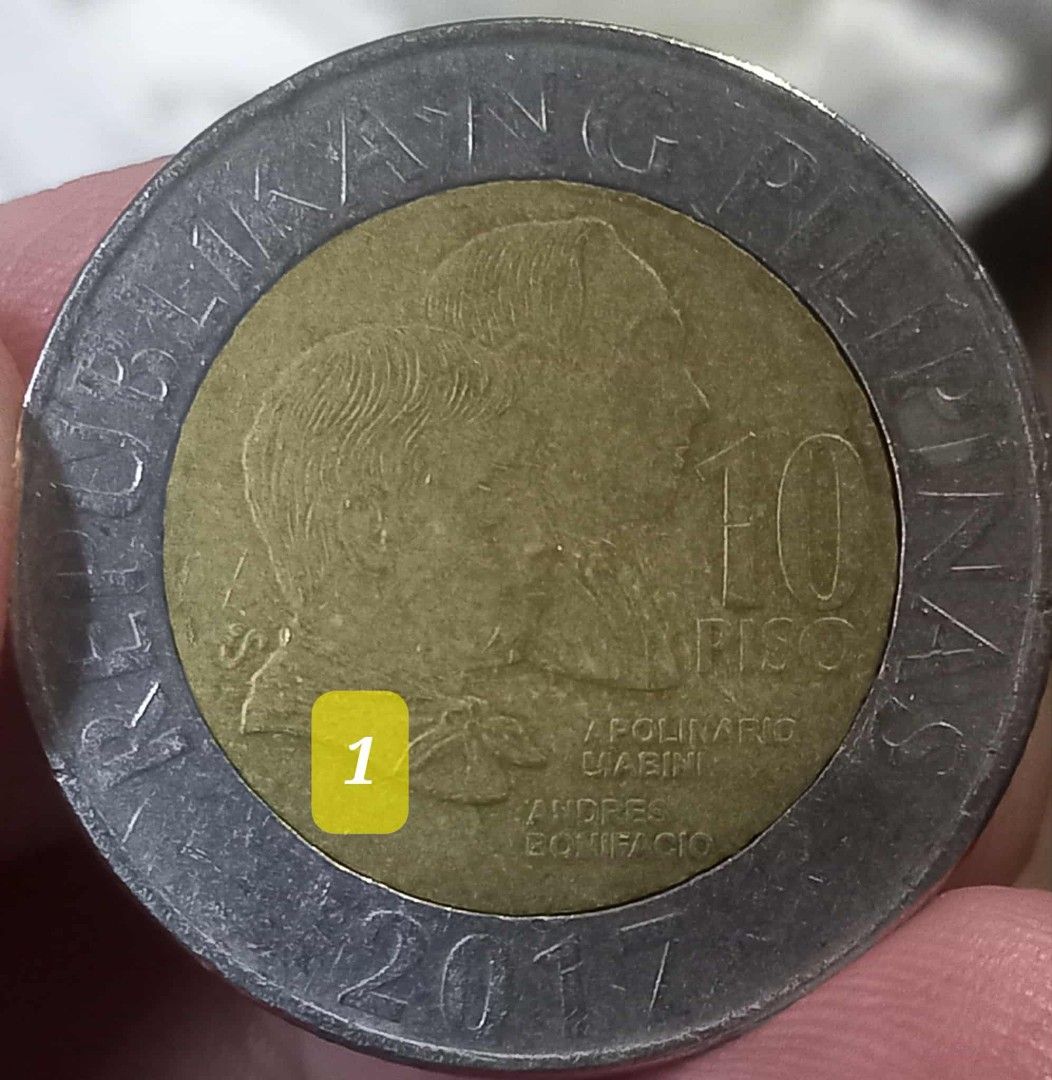 2017 10peso BSP coin error (Category: Currency) located in San Mateo. Submitted by daddyB918 (Listing ID 1404129449, Image 1). Description: 2017 10peso BSP series DDO/DDR wear strike of "Republika ng Pilipinas" at "Bangko Sentral ng Pilipinas".