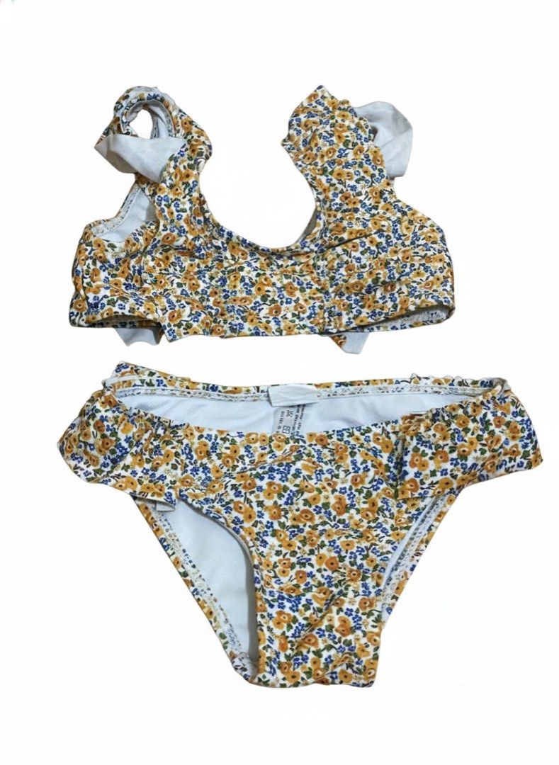 2pcs 2T Kids' Swimsuit (Category: Babies & Kids Fashion) located in Manila. Submitted by hellomenggay (Listing ID 1404044586, Image 2). Description: Set Includes: - One rashguard with unicorn design and blue sleeves. - Two-piece floral bikini. - Ideal for beach and pool. - Likely made of quick-drying material. Shein and Sm Brand.