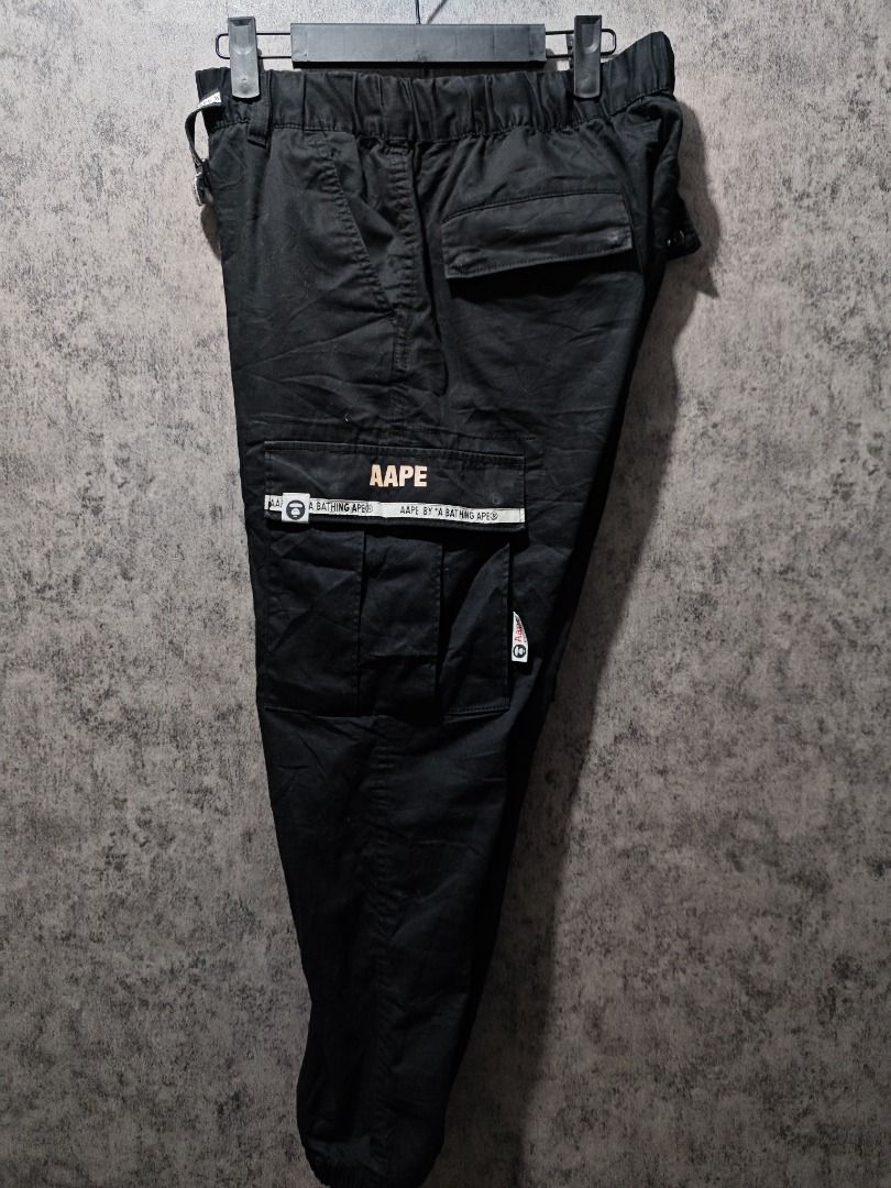 AAPE BLACK CARGO PANTS (Category: Joggers) located in Quezon City. Submitted by wgapparel (Listing ID 1404151164, Image 2). Description: G04 AAP3 BLACK CARGO PANTS ---------------- • Dimes: 30 – 31 waistline, 35 L • Condition: Almost BN pa • Color Rate: 9.6 • Complete Tags • Authentic • Issue: None 𝗗𝗶𝘀𝗰𝗹𝗮𝗶𝗺𝗲𝗿: WinGaming®Apparel is not associated or affiliated with any of the brands featured. All trademarks and copyrights reserved to the