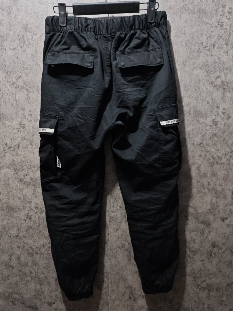 AAPE BLACK CARGO PANTS (Category: Joggers) located in Quezon City. Submitted by wgapparel (Listing ID 1404151164, Image 3). Description: G04 AAP3 BLACK CARGO PANTS ---------------- • Dimes: 30 – 31 waistline, 35 L • Condition: Almost BN pa • Color Rate: 9.6 • Complete Tags • Authentic • Issue: None 𝗗𝗶𝘀𝗰𝗹𝗮𝗶𝗺𝗲𝗿: WinGaming®Apparel is not associated or affiliated with any of the brands featured. All trademarks and copyrights reserved to the