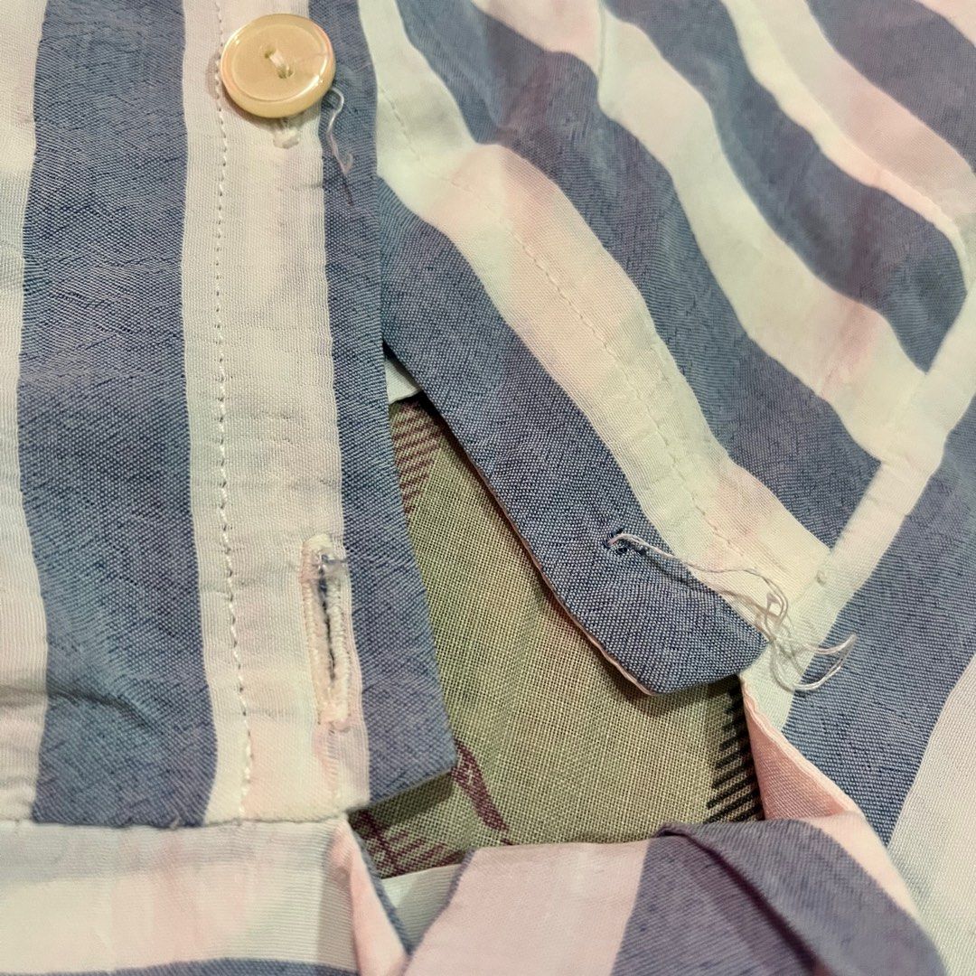 Bershka Tie-front Striped Crop Top (Category: Blouses) located in Manila. Submitted by _cxlx (Listing ID 1404128232, Image 3). Description: Size: XS (may fit semi-m) RFS: too fit for my liking Brand: Bershka Color: White-Blue Stripes Used only once Flaw: Missing button.