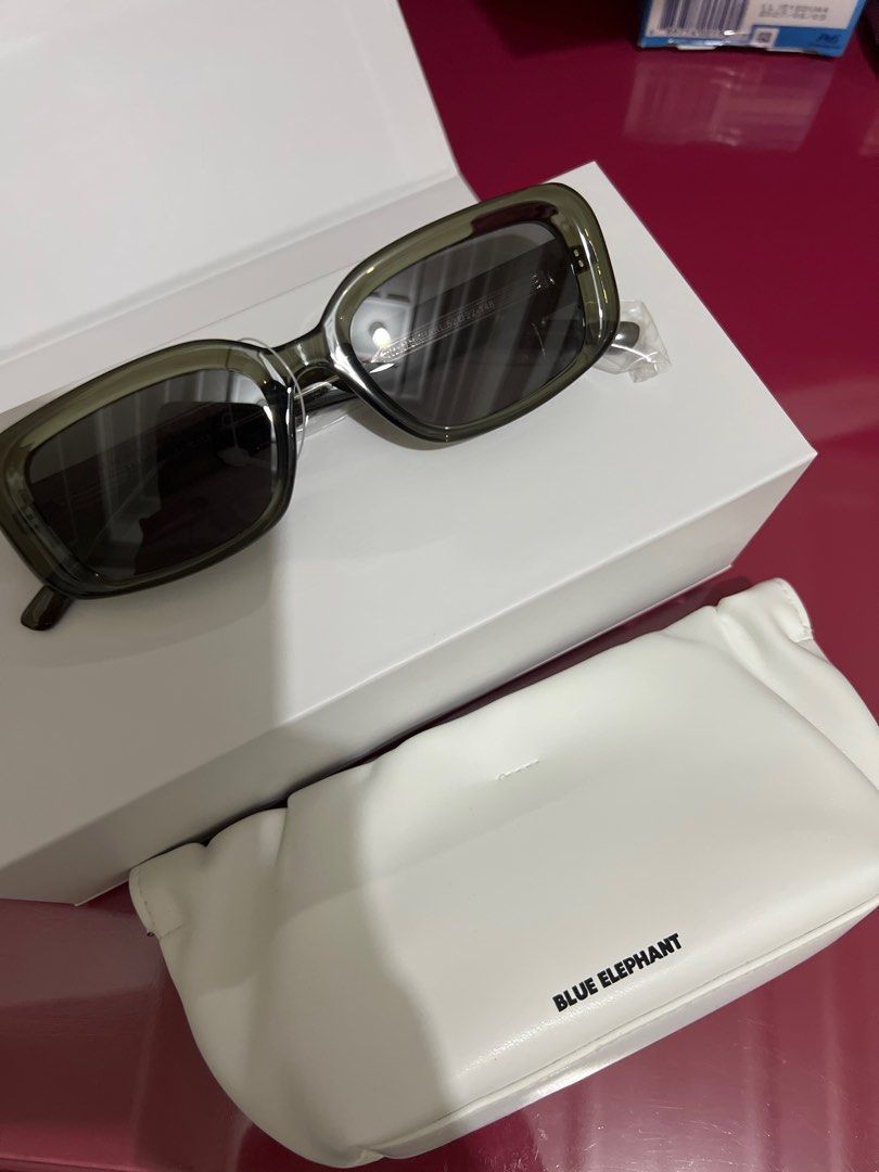 Blue Elephant Irish Khaki Crystal Sunglasses (Category: Sunglasses & Eyewear) located in Bulacan. Submitted by __randomthings (Listing ID 1404032280, Image 1). Description: - Blue Elephant Irish sunglasses - Khaki crystal color - Excellent, unworn condition - Includes protective case - Comes with original box - Adds sophistication to any outfit.