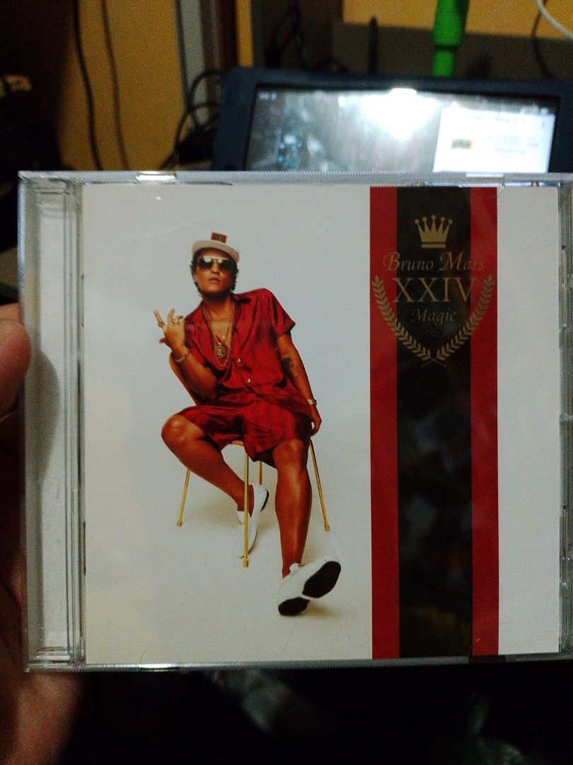 2 Bruno Mars CD Albums Unorthodox Jukebox/24K Magic (Category: CDs & DVDs) located in San Jose del Monte. Submitted by xtian.jvne (Listing ID 1404098037, Image 2). Description: Two Bruno Mars CD albums are available. One is "Unorthodox Jukebox" and the other is "24K Magic". The "24K Magic" CD is still sealed in its original packaging. The tracklists for both albums are visible in the images. 650 each.