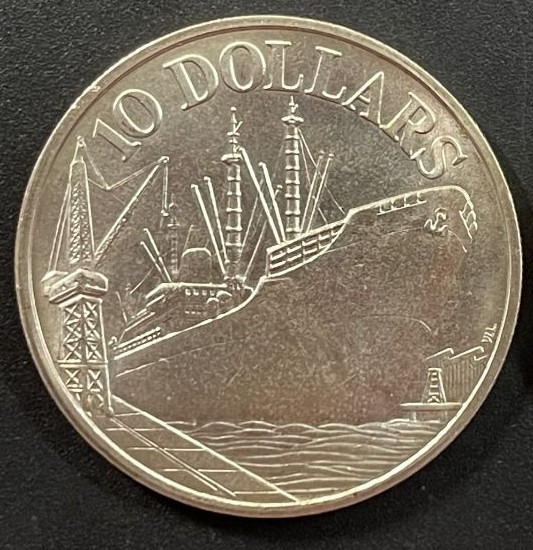 Freighter berthed alongside a wharf, 1975, $10 Uncirculated Silver (50% ...