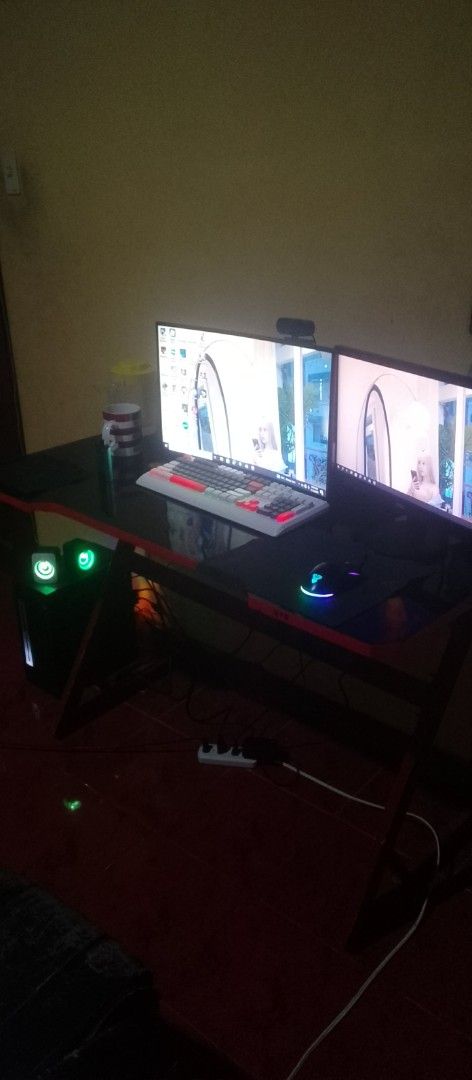 Gaming PC Setup with Dual Monitors (Category: Desktops) located in Santa Cruz, Pampanga. Submitted by juliajalan05857 (Listing ID 1404012270, Image 2). Description: specs take all PC Tower AMD A8-7680 (Radeon R7), 16 GB RAM, Windows 10 Pro — older gen but still good for office/school/light gaming 1tb ssd ramsta 1tb hdd Monitor 1 (AOC) 22″–24″, 1080p Monitor 2 (ViewPoint) similar size/spec Gaming Table mid-size, red-black edges, good condition RGB