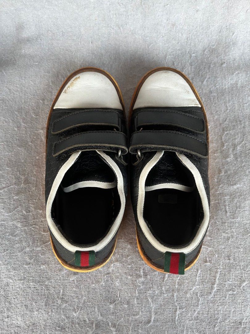 Gucci Sneaker Black Leather Velcro (Category: Babies & Kids Fashion) located in Bulacan. Submitted by stacksonracks_ph (Listing ID 1404125369, Image 1). Description: Size: 31.
