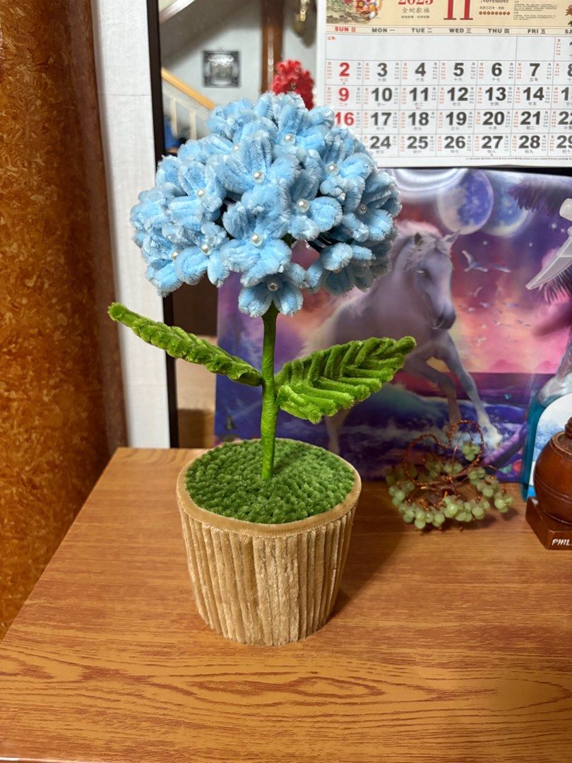 Handmade Blue Hydrangea Flower (Category: Flowers & Bouquets) located in Cavite. Submitted by marissa0_0 (Listing ID 1404157365, Image 2). Description: - Handmade blue hydrangea flower. - Features a soft, fuzzy texture. - Adorned with delicate pearl accents. - Designed for home decor or gifting. - In excellent condition..
