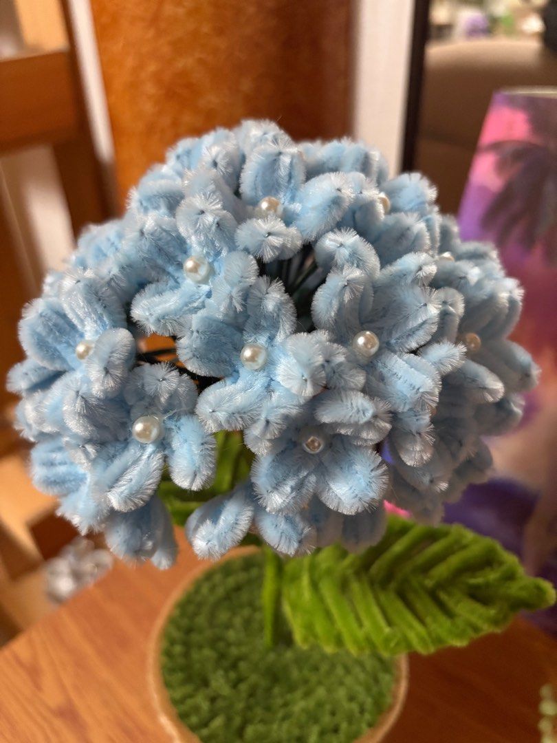 Handmade Blue Hydrangea Flower (Category: Flowers & Bouquets) located in Cavite. Submitted by marissa0_0 (Listing ID 1404157365, Image 3). Description: - Handmade blue hydrangea flower. - Features a soft, fuzzy texture. - Adorned with delicate pearl accents. - Designed for home decor or gifting. - In excellent condition..
