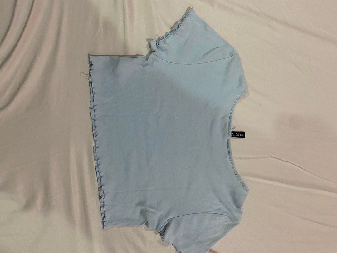 H&M The Cowboy Ranch Crop Top (Category: Sleeveless) located in Manila. Submitted by 123declutter5 (Listing ID 1404130932, Image 2). Description: H&M Divided Light Blue Crop Top Selling for ₱50.