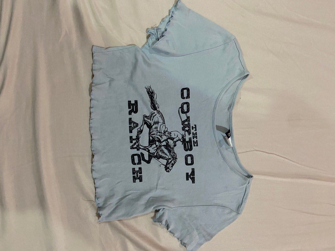 H&M The Cowboy Ranch Crop Top (Category: Sleeveless) located in Manila. Submitted by 123declutter5 (Listing ID 1404130932, Image 1). Description: H&M Divided Light Blue Crop Top Selling for ₱50.