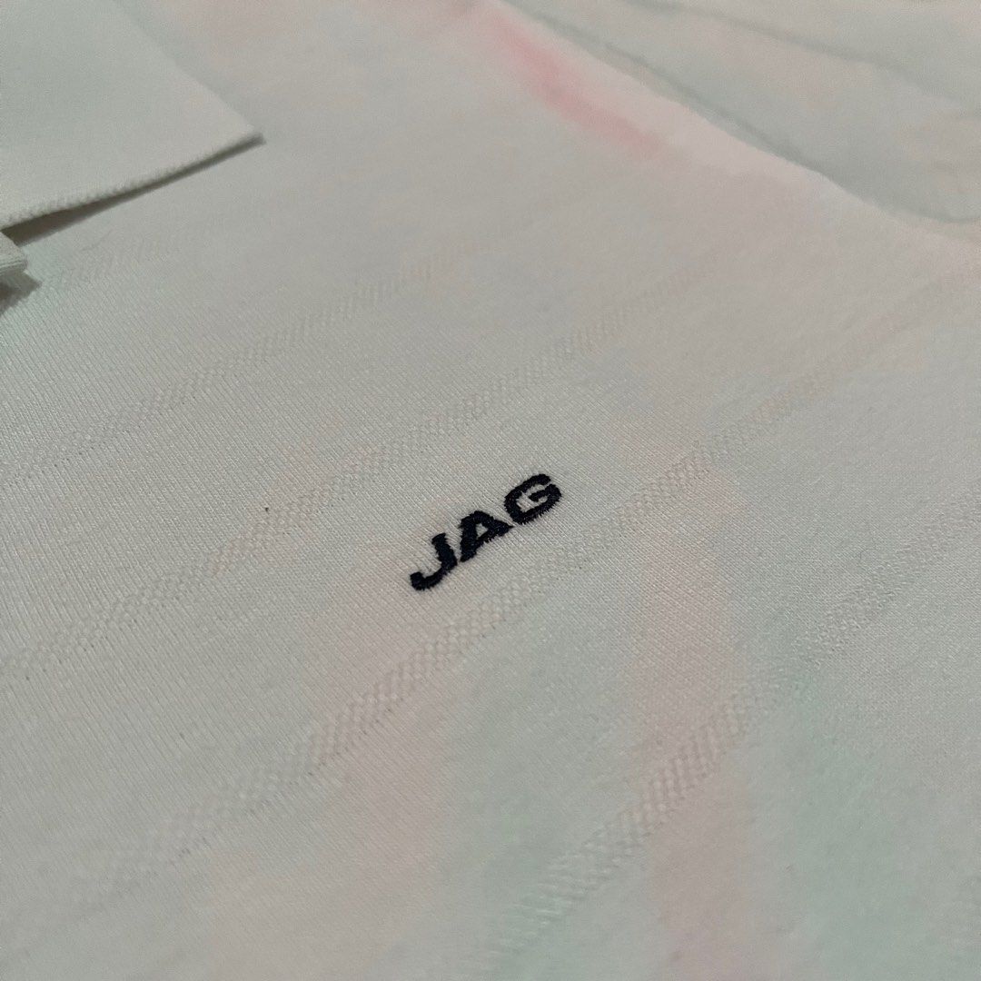 JAG Jeans White Polo Shirt (Category: Blouses) located in Manila. Submitted by _cxlx (Listing ID 1404128216, Image 3). Description: Size: XL RFS: Too Large + Nakatambak nalang. Brand: JAG Color: White Used only once No flaws.