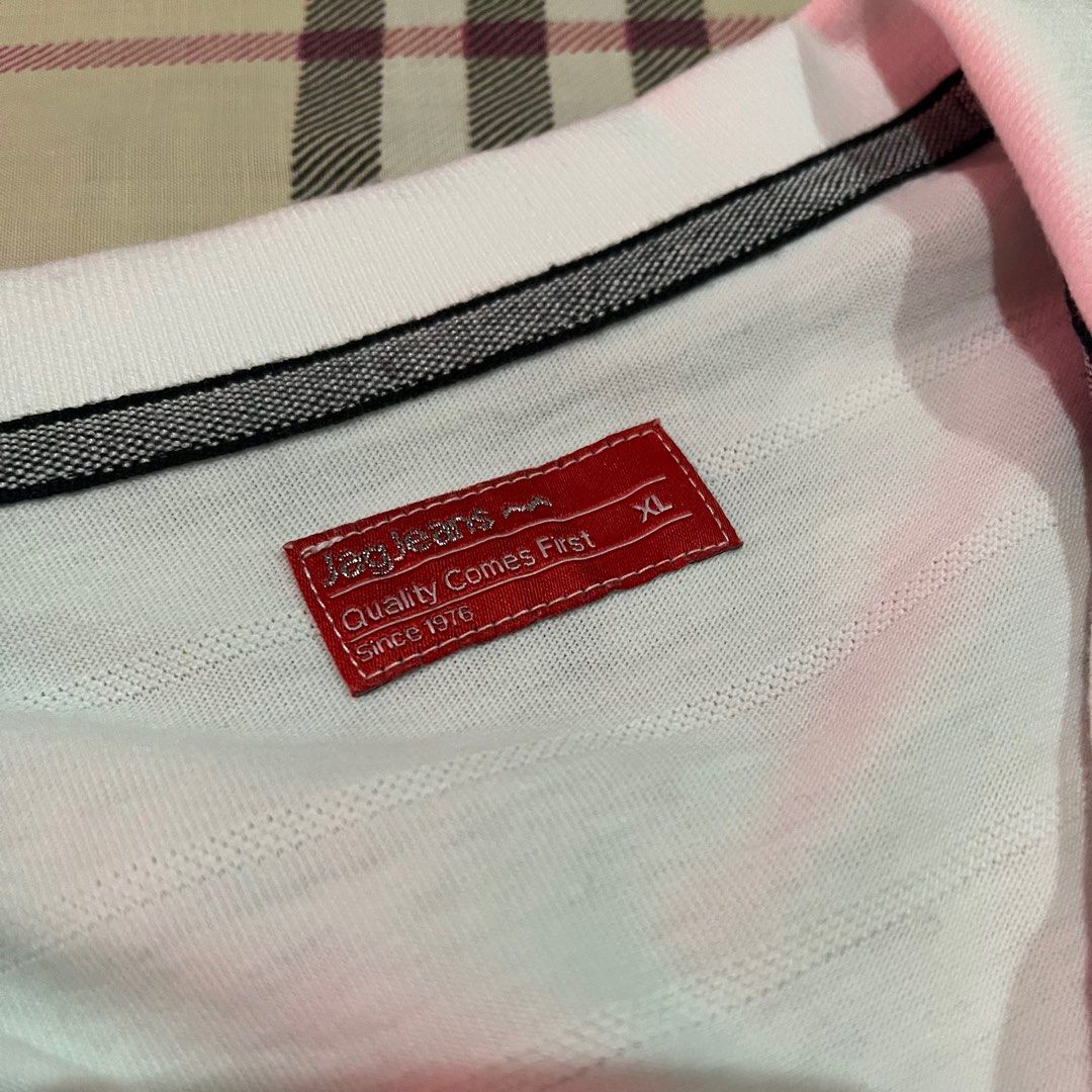JAG Jeans White Polo Shirt (Category: Blouses) located in Manila. Submitted by _cxlx (Listing ID 1404128216, Image 2). Description: Size: XL RFS: Too Large + Nakatambak nalang. Brand: JAG Color: White Used only once No flaws.