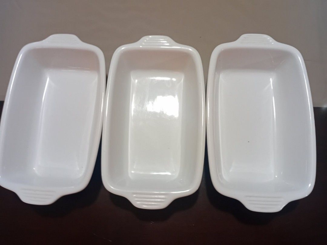 Lodge Ceramic Baking Dish (Category: Bakeware) located in Santa Rosa. Submitted by mariekarol23638 (Listing ID 1404031177, Image 2). Description: - P500 each - Set of three white ceramic baking dishes. - Rectangular shape with handles. - One dish features the Lodge logo. - Ideal for baking various dishes..