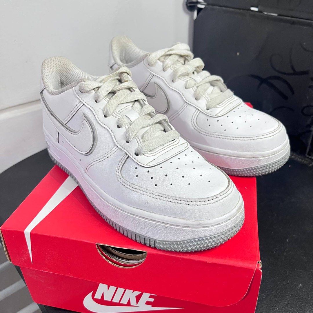 Nike Air Force 1 Low White Wolf Grey Sole GS (Category: Sneakers) located in Manila. Submitted by rvpatoothie (Listing ID 1404121405, Image 2). Description: - Nike Air Force 1 Low - White Grey Sole colorway - Size: 4Y / EUR 36 - Style Code: DX5805-100 - Includes Nike box - Minor wear on soles Guaranteed Original. Used but not abused. Bought from Nike App. RFS: Decluttering and Downsizing .