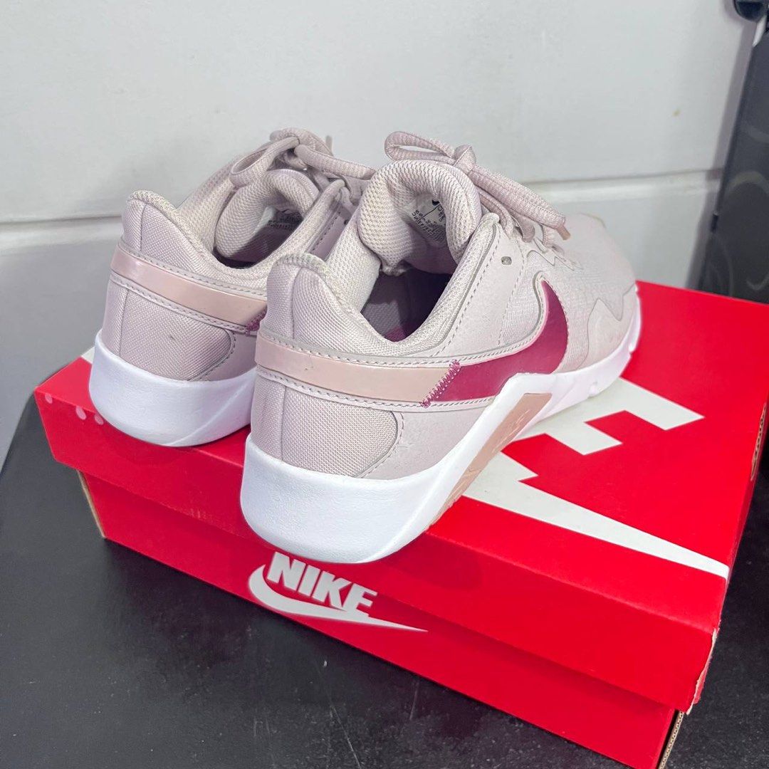 Nike Women's Training Shoes (Category: Sneakers) located in Manila. Submitted by rvpatoothie (Listing ID 1404119027, Image 3). Description: - Nike training shoes in light pink - White sole with pink Nike swoosh - Size: US 5.5, UK 3, EUR 36, 22.5 CM - Includes Nike box.