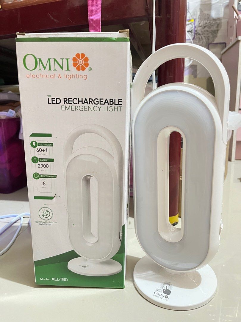 Omni LED Rechargeable Emergency Light AEL-T60 (Category: Lighting) located in Rizal. Submitted by chezcaaphrodite (Listing ID 1404075953, Image 1). Description: Omni LED Rechargeable Emergency Light AEL-T60 - With box and charger - working light - maliwanag pa and complete ang ilaw - malakas ang ilaw - working switch - pwede gawing desk lamp/study light/lantern sa study table - pwede sa bumibili ng parts ng electronics/lighting issue: need nakasa