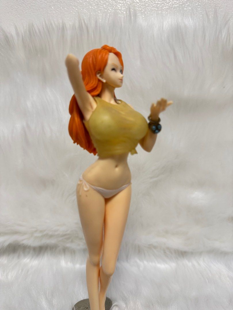 One Piece Nami Figure (Category: Figurines & Statues) located in Paranaque City. Submitted by wolf5037 (Listing ID 1404005669, Image 1). Description: - One Piece Nami figure - Features Nami in a bikini and top - Orange hair and dynamic pose - Includes a display base - Highly detailed and well-crafted - Perfect for One Piece collectors.