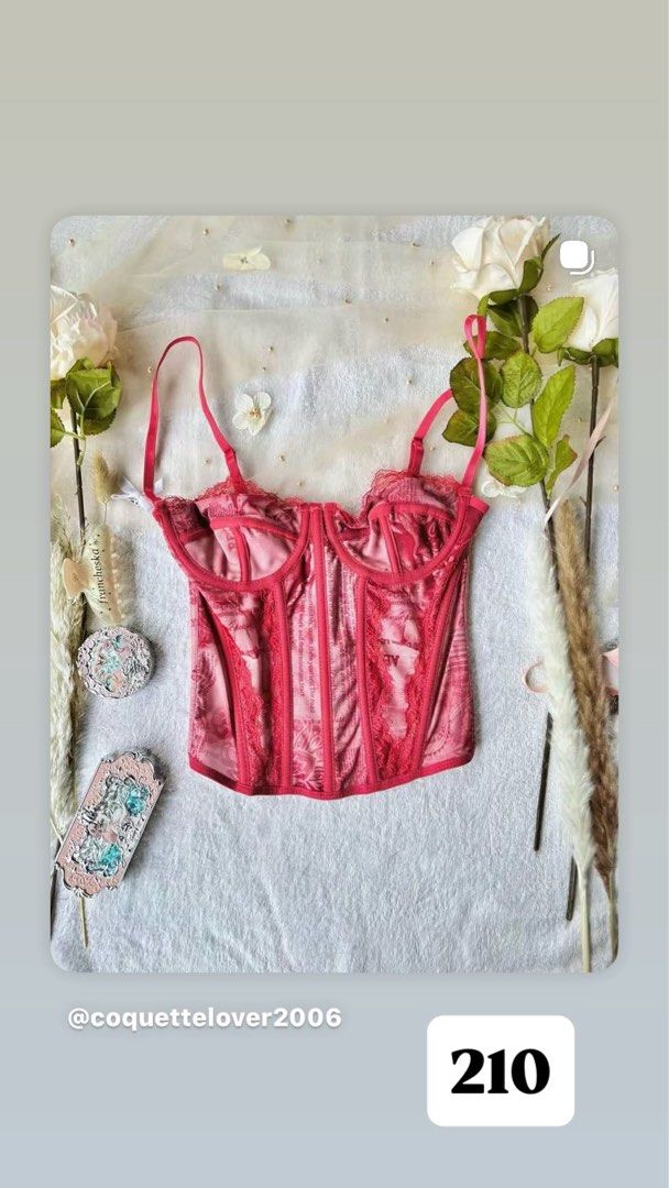 Pink Lace Corset Top (Category: Others Tops) located in Manila. Submitted by cheskakaja56499 (Listing ID 1404078346, Image 1). Description: - Pink corset top - Lace detailing - Adjustable straps - Flattering silhouette - Soft, textured fabric - Front closure - Perfect for layering or as a statement piece.