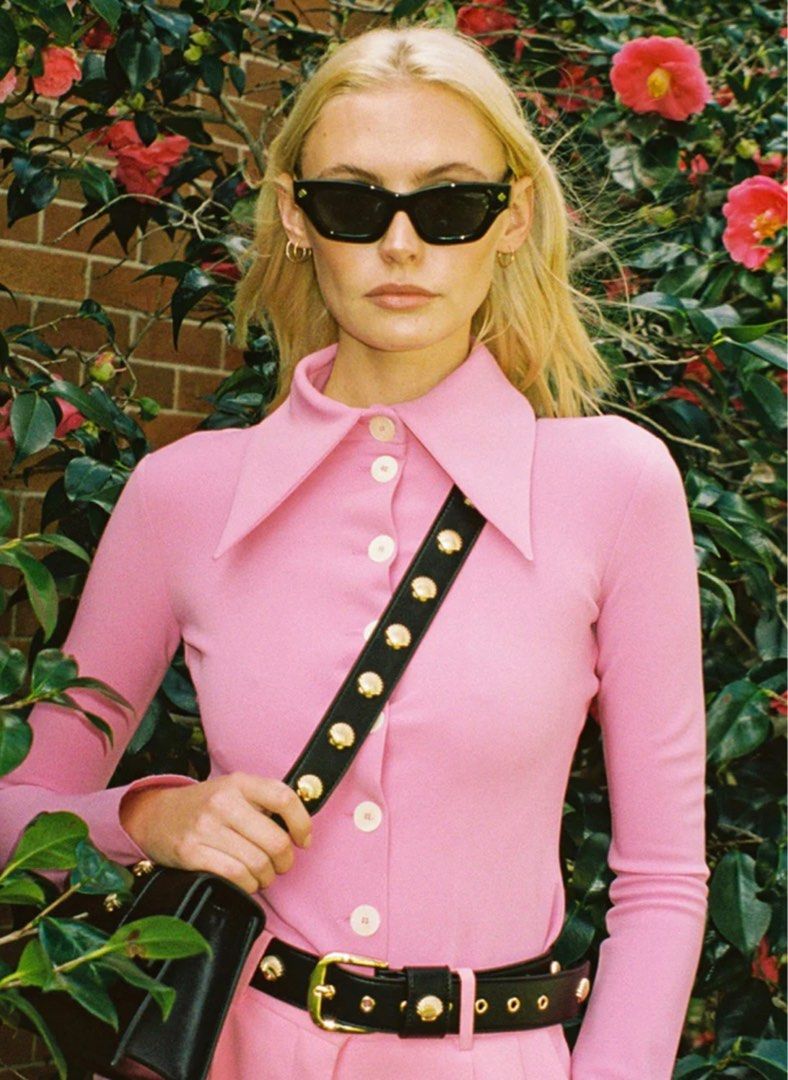 Poppy Lissiman Sunglasses (Category: Sunglasses & Eyewear) located in Bulacan. Submitted by __randomthings (Listing ID 1404032884, Image 3). Description: - Poppy Lissiman sunglasses - Black frame - Includes original box, case, and cleaning cloth - Unique frame shape - Brand name visible on temples - Perfect for fashion and sun protection.