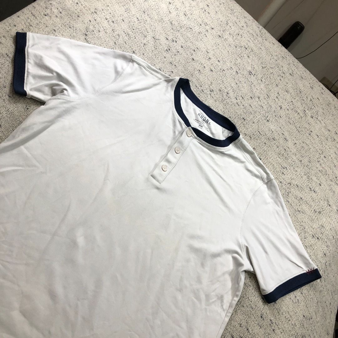 Rhone Ringer Performance Henley T-shirt In White Size Medium (Category: Activewear) located in Santa Rosa. Submitted by sergids (Listing ID 1404130560, Image 2). Description: Rhone Ringer Performance Henley T-shirt In White Size Medium Stay cool, comfortable, and sharp with the Rhone Ringer Performance Henley, designed for both training and everyday wear. Made with premium moisture-wicking performance fabric, this Henley offers stretch, breathabi