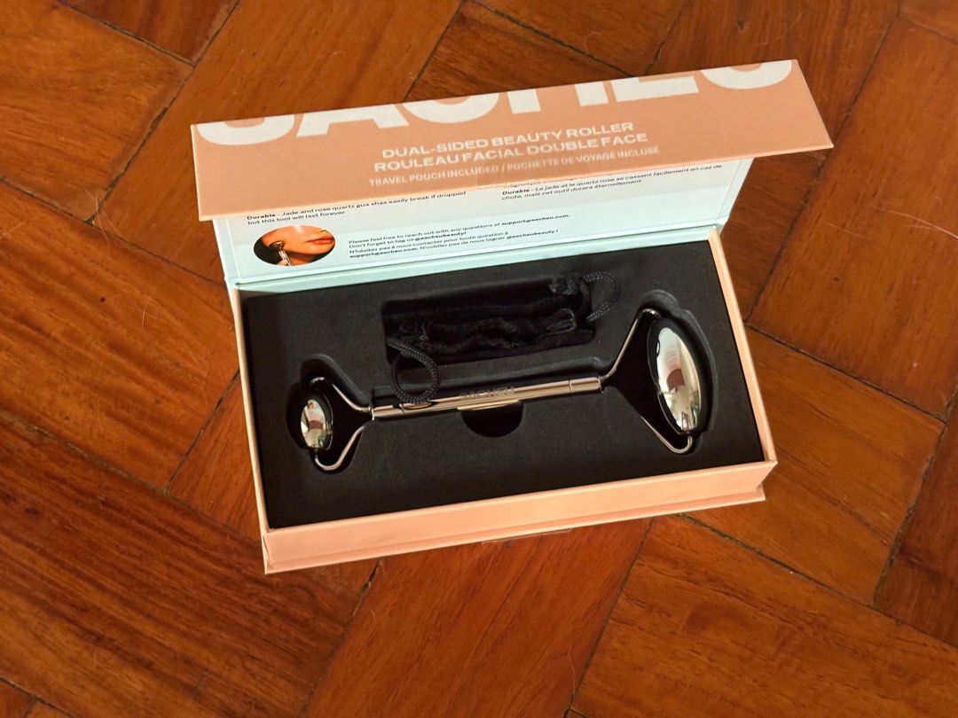 Sacheu Dual-Sided Beauty Roller (Category: Face Care) located in Quezon City. Submitted by mcpar9685821 (Listing ID 1404078299, Image 2). Description: •Never used •Priced at ₱2,100, selling for ₱1,800 (₱300 off) •Made of stainless steel, will last a lifetime •Also includes a travel pouch .
