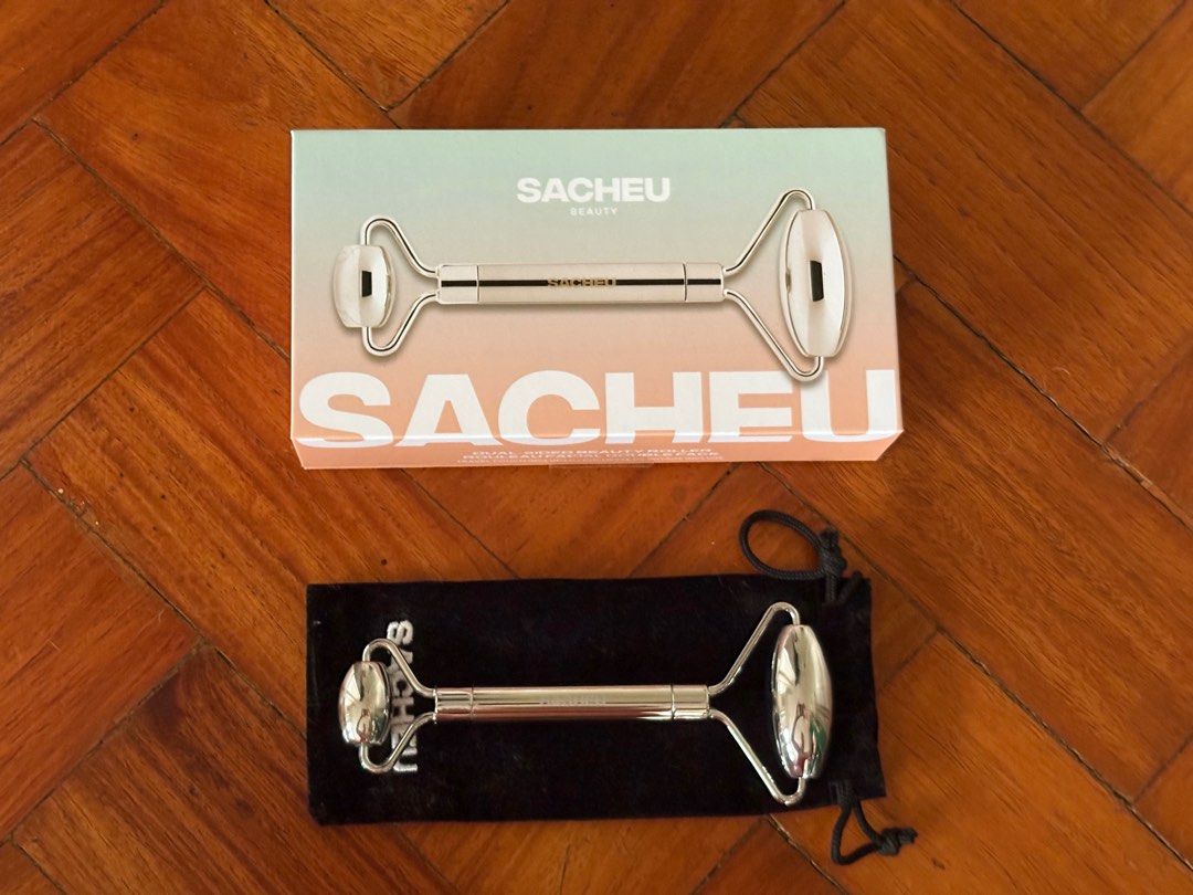 Sacheu Dual-Sided Beauty Roller (Category: Face Care) located in Quezon City. Submitted by mcpar9685821 (Listing ID 1404078299, Image 3). Description: •Never used •Priced at ₱2,100, selling for ₱1,800 (₱300 off) •Made of stainless steel, will last a lifetime •Also includes a travel pouch .