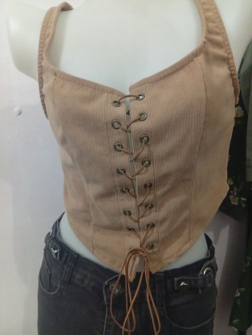 SHEIN Corduroy Corset Top (Category: Others Tops) located in Caloocan City. Submitted by celinesrtw (Listing ID 1404169969, Image 1). Description: - SHEIN Corduroy Corset Top - Size: EU S / US 4 - Color: Light Brown - Features: Halter neck, lace-up front - Style: Pairs well with high-waisted bottoms.
