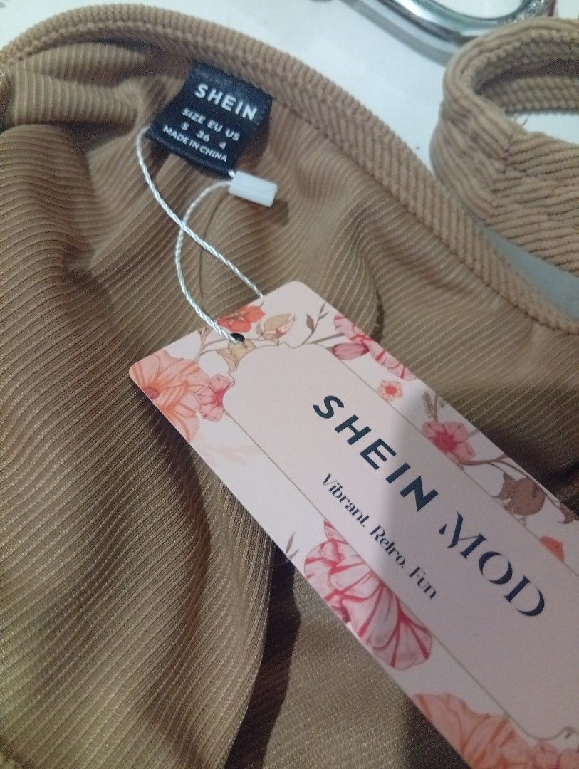 SHEIN Corduroy Corset Top (Category: Others Tops) located in Caloocan City. Submitted by celinesrtw (Listing ID 1404169969, Image 2). Description: - SHEIN Corduroy Corset Top - Size: EU S / US 4 - Color: Light Brown - Features: Halter neck, lace-up front - Style: Pairs well with high-waisted bottoms.