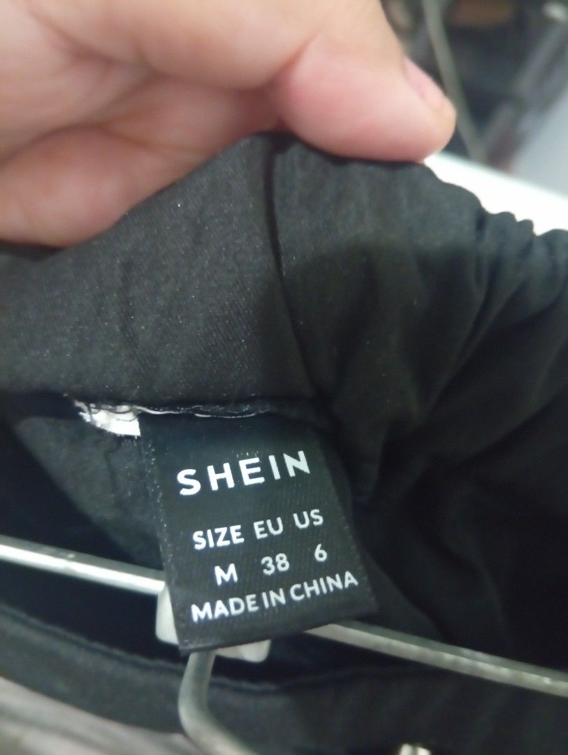 SHEIN Floral Embroidered Pants - Size M (Category: Other Bottoms) located in Caloocan City. Submitted by celinesrtw (Listing ID 1404169923, Image 2). Description: - SHEIN black pants - Features colorful floral embroidery - Size: M (as per tag) - Button and zipper closure - Made in China.