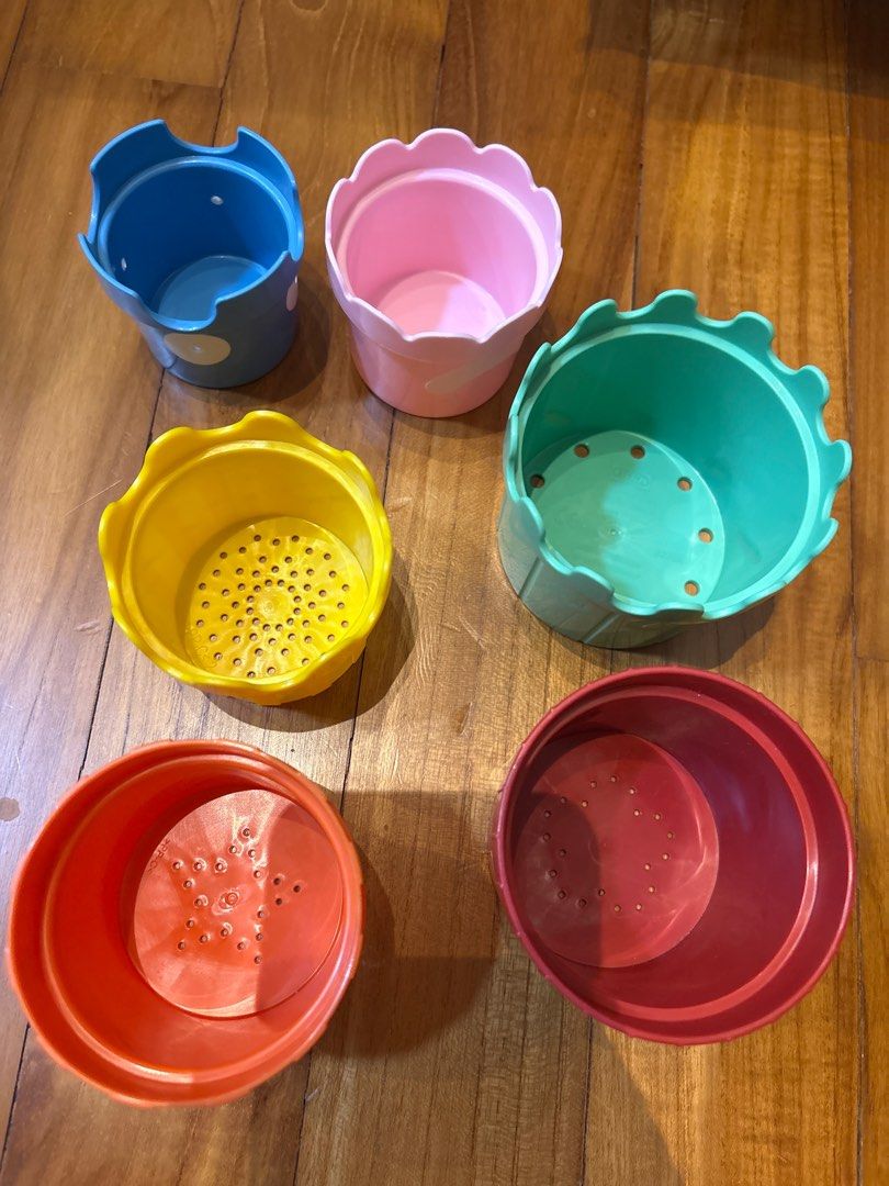 Stacking cups (Category: Infant Playtime) located in Singapore. Submitted by mary_toh (Listing ID 1404084968, Image 1). Description: 6 bright colored cups stack together Water play fun with holes in the bottom Made without BPA, lead or phthalates For Ages 6 months and up.