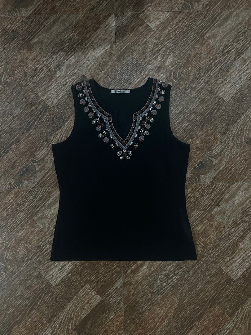 Vintage Beaded Ribbed Sando Sleeveless Top (Category: Tshirts & Polo Shirts ) located in Quezon City. Submitted by theukayera (Listing ID 1404128091, Image 1). Description: Complete beads, thick and quality fabric (unlike sa fast fashion brands!) Unisex Laid flat measurements: Length: 23” Shoulder to pit: 8.5” Pit to pit: 18.5”-20” On hand and ready to ship!.