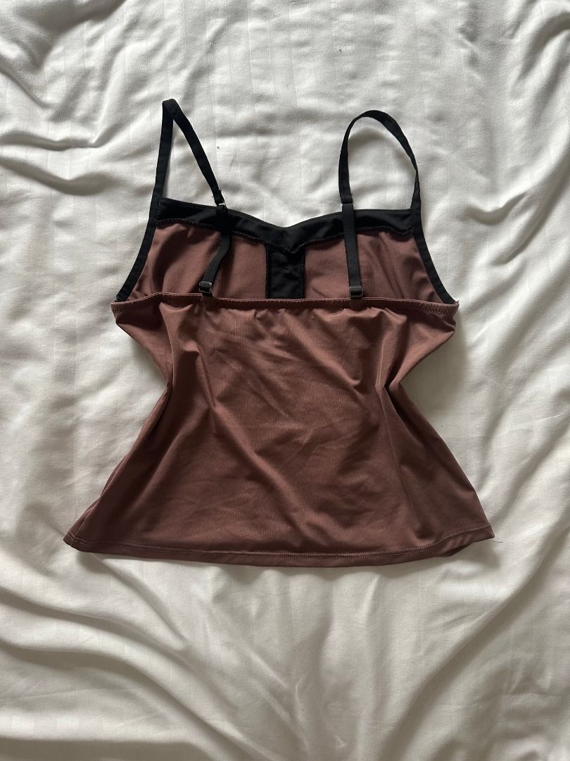 Vintage Brown Cami Top with Black Straps (Category: Sleeveless) located in Makati City. Submitted by wombat178 (Listing ID 1404102365, Image 2). Description: - Willing to keep - Brown cami top - Doubles as a tankini - Made with swimsuit material - Black straps and trim - Adjustable straps.