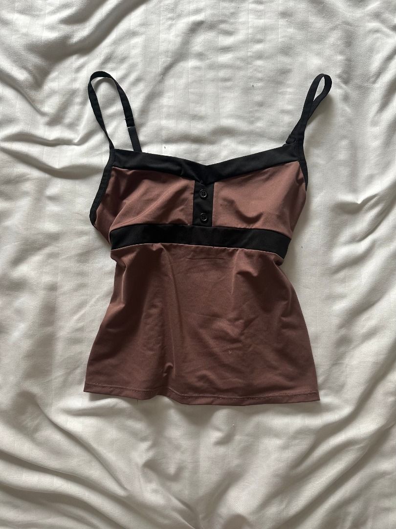 Vintage Brown Cami Top with Black Straps (Category: Sleeveless) located in Makati City. Submitted by wombat178 (Listing ID 1404102365, Image 1). Description: - Willing to keep - Brown cami top - Doubles as a tankini - Made with swimsuit material - Black straps and trim - Adjustable straps.