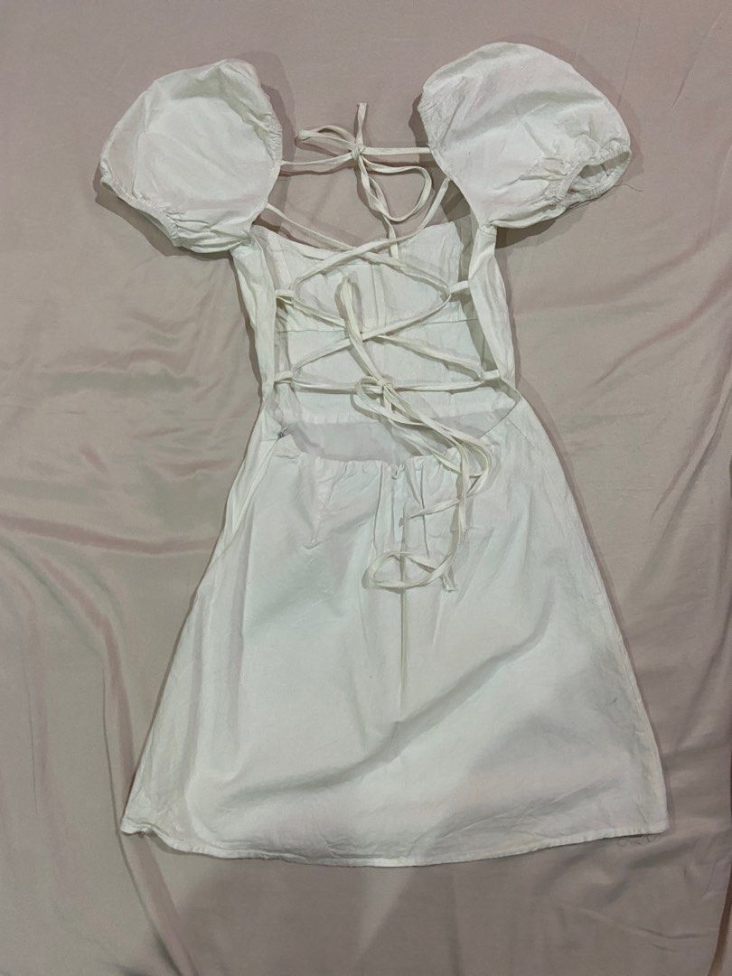 White Puff Sleeve Backless Dress (Category: Dresses) located in Manila. Submitted by 123declutter5 (Listing ID 1404133497, Image 2). Description: Got this for ₱699 Selling for ₱240 Rfs: declutter mod: lalamove, jnt mop: gcash, bpi.