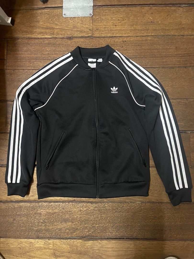 Adidas SST Track Jacket Black (Category: Coats, Jackets and Outerwear) located in Dumaguete. Submitted by markyooo (Listing ID 1404177998, Image 1). Description: RFS- Decluttering - 10/10 condition - 10/10 colorate - no issues .