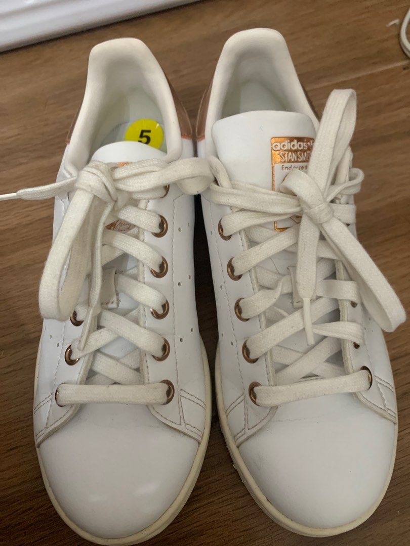 Adidas Stan Smith White and Rose Gold (Category: Sneakers) located in Rizal. Submitted by bien_aime (Listing ID 1404199709, Image 2). Description: - Adidas Stan Smith shoes - White with rose gold accents - Stan Smith logo on tongue and heel - Classic design - Size 5.