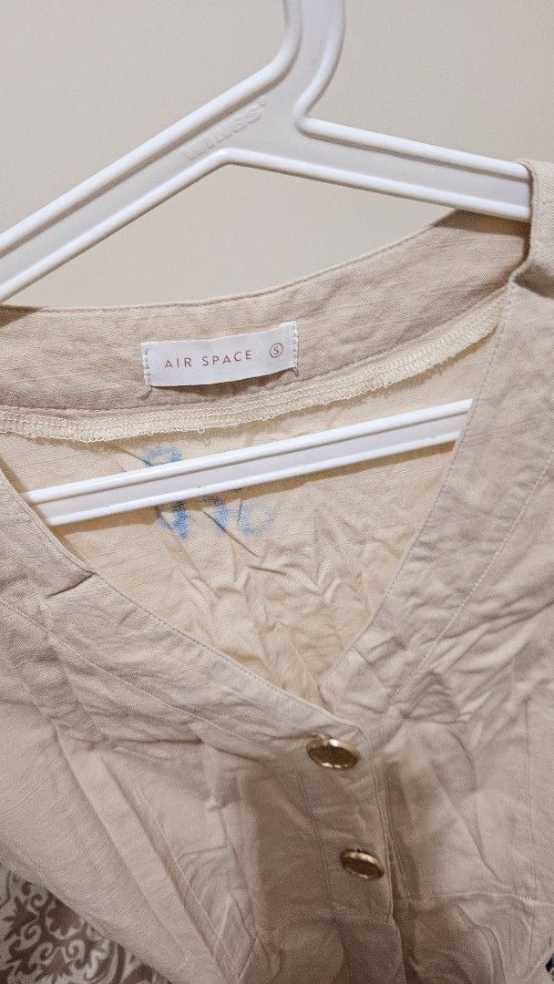 Air Space Beige Dress (Category: Dresses) located in Manila. Submitted by teilybam (Listing ID 1404349297, Image 2). Description: - Air Space beige dress - Button-down front - Tie waist - Short sleeves - Lightweight fabric - Neutral color - Versatile for various occasions.