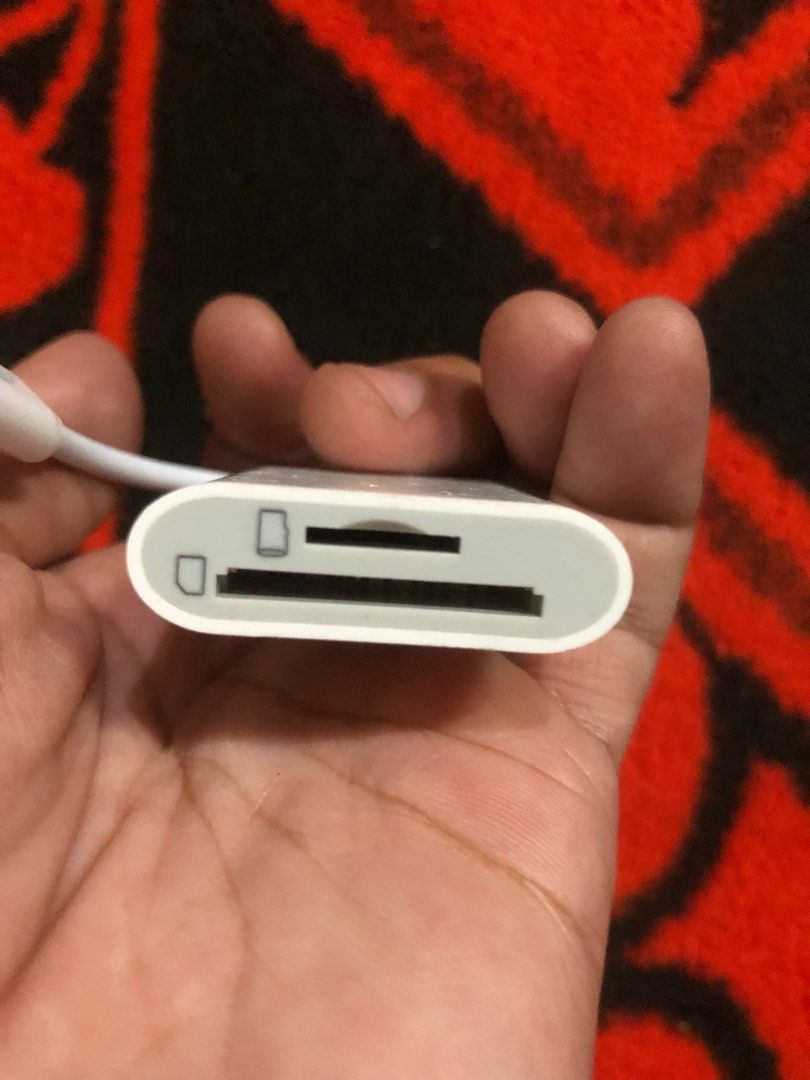 Apple SD MicroSD Card reader (Category: Memory & SD Cards) located in Quezon City. Submitted by markgolveo (Listing ID 1404333778, Image 3). Description: Apple SD MicroSD Card reader.