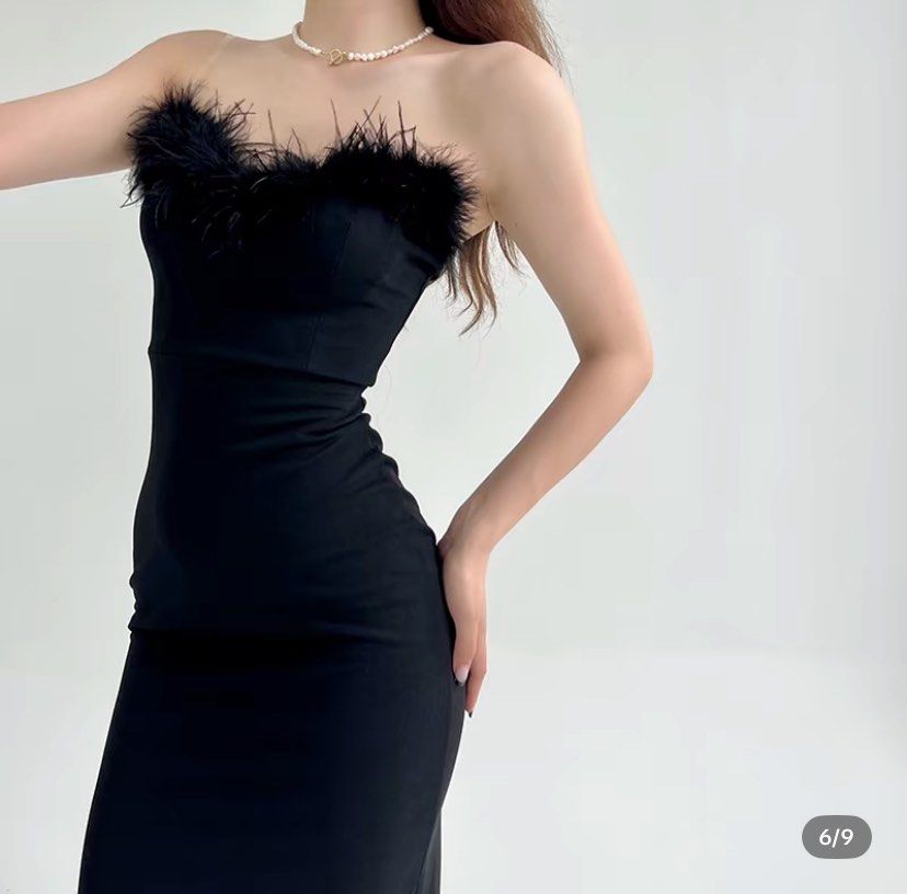 Black Feather Trim Strapless Dress (Category: Dresses) located in Batangas. Submitted by yybba (Listing ID 1404220575, Image 2). Description: - Black strapless midi dress - Feather trim neckline - Fitted silhouette - Side slit detail - Smooth, solid fabric - Ideal for special events.
